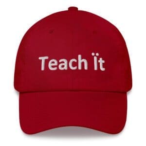 Red cap embroidered with "Teach it"