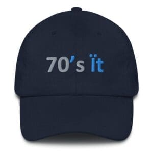 Navy blue cap with "70's it" text.