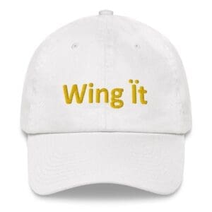 White cap with "Wing it" embroidered text.