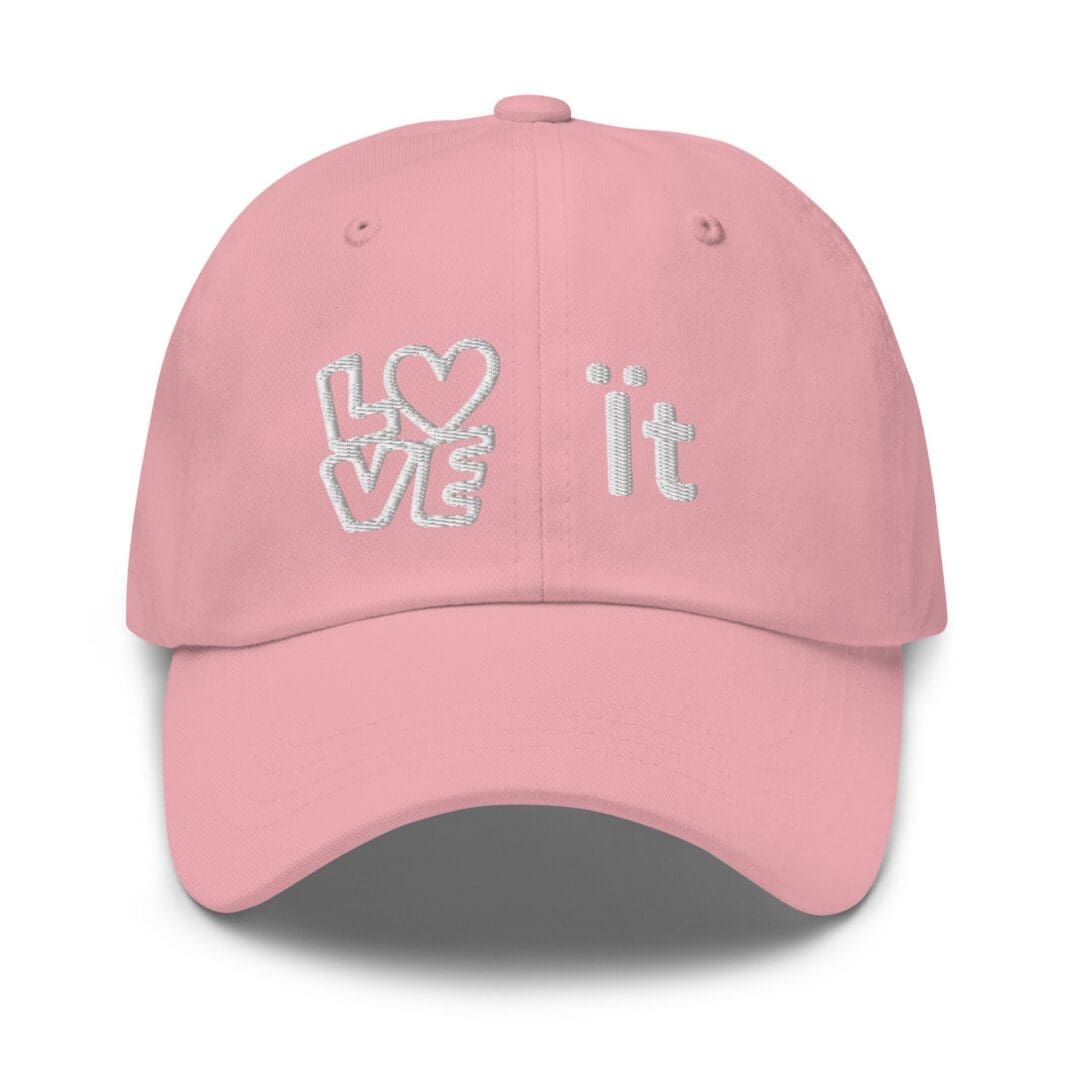 Pink baseball cap with white 'love it' embroidery