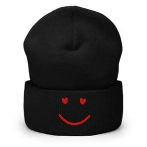 Black knit beanie with red heart smiley