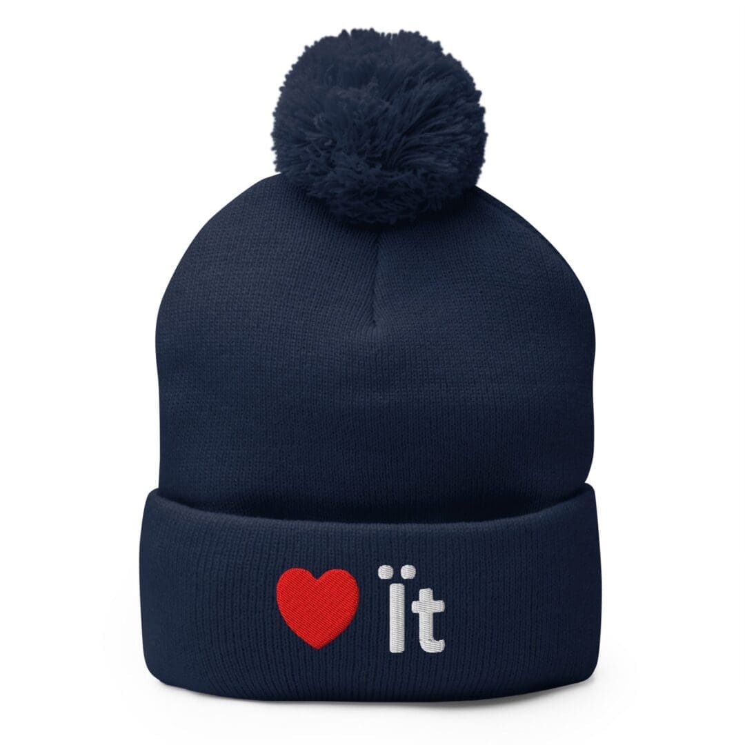 Navy knit beanie with pompom and heart