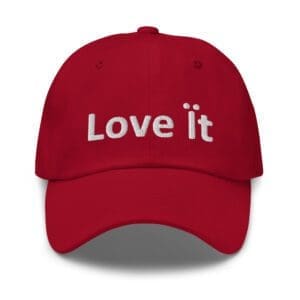Red baseball cap embroidered with "Love it"