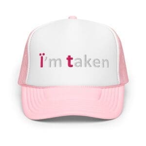 Pink and white trucker hat reading "I'm taken"