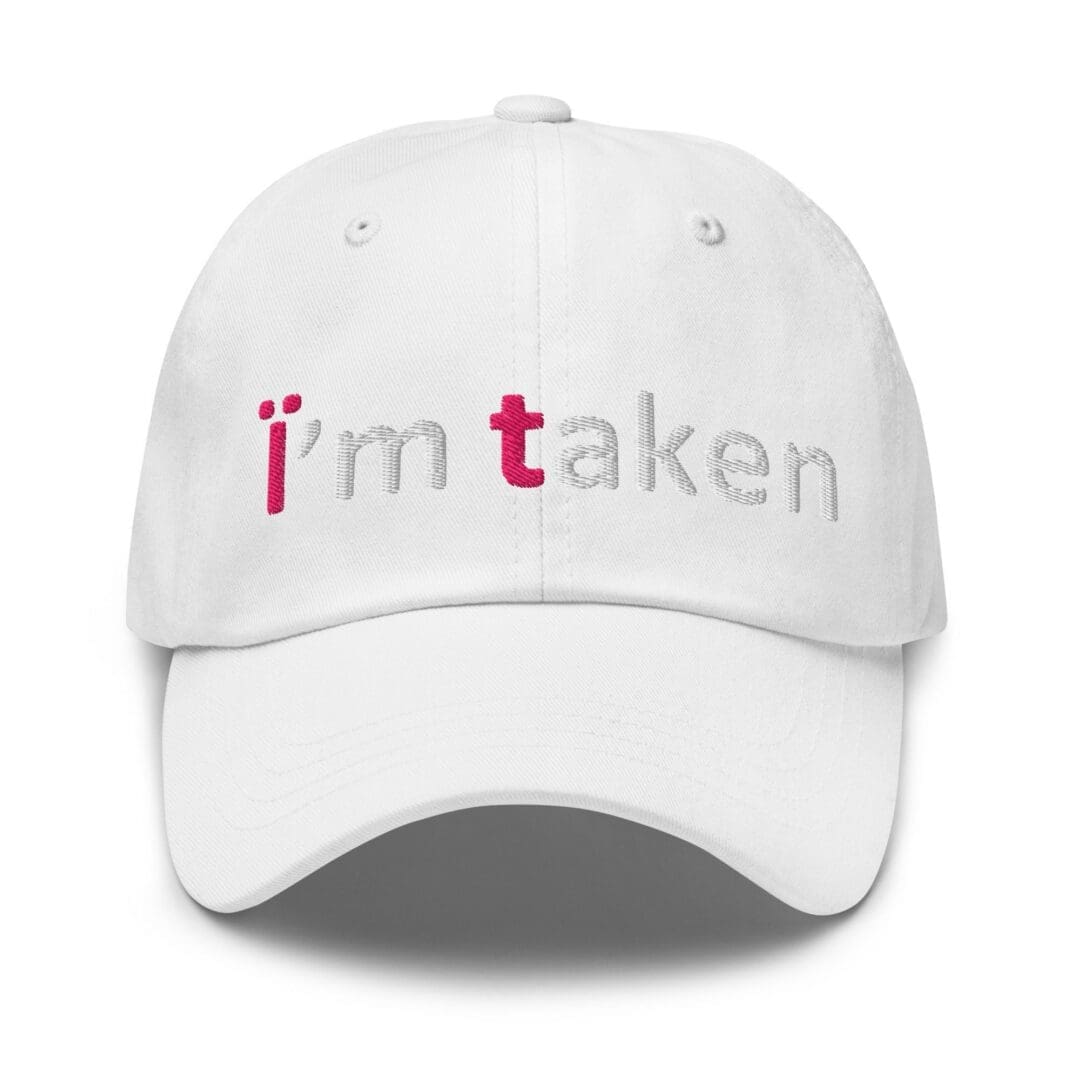 White baseball cap embroidered with "i'm taken"