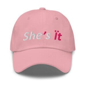 Pink cap embroidered "She's it"
