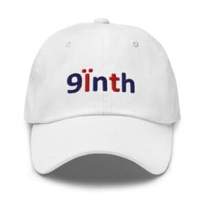 White cap with red and blue embroidered text